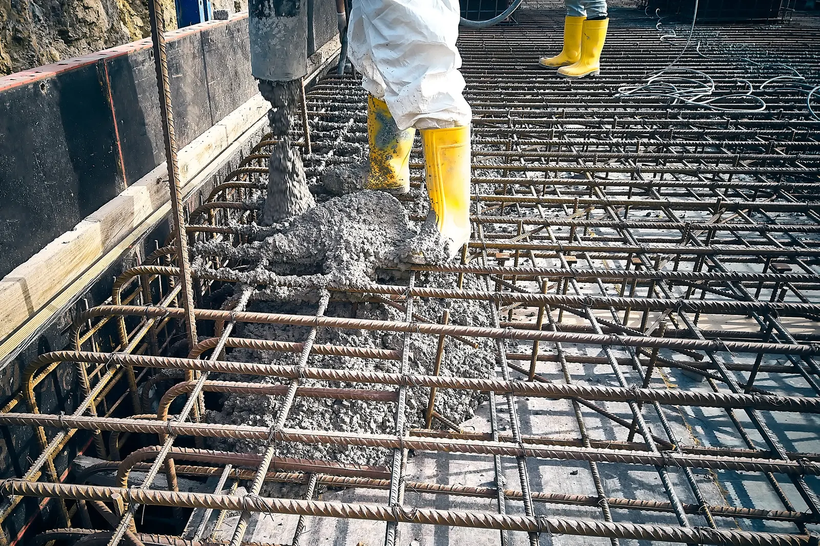 Commercial concrete pour over steel rebar reinforcement grid